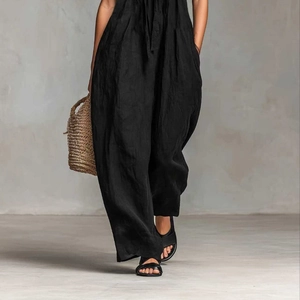 Women's minimalist black wide-leg jumpsuit with waist tie and textured linen fabric