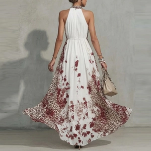 Halter neck leopard floral maxi dress with cinched waist and flowing skirt