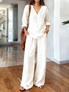 Modern V-neck long sleeve top and wide-leg trousers in textured washed cotton
