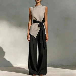Women's chic beige sleeveless high neck top with tie waist and black wide leg pants set