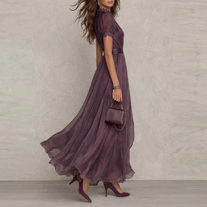 Detailed side view of purple chiffon V-neck dress with lace trim and bubble sleeves