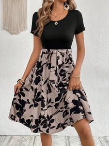 Romantic floral patchwork dress with black ribbed short sleeve top and waist tie bow