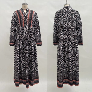 Front and back detail of V-neck floral maxi dress with long sleeves and smocked cuffs