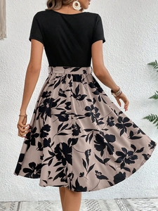 Elegant back view of floral print high waist midi dress with black short sleeve bodice