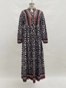 Detail of V-neck floral maxi dress with ethnic prints and buttoned front bodice