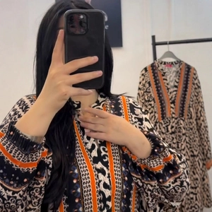 Bohemian floral long sleeve V-neck maxi dress with vintage ethnic patterns in orange