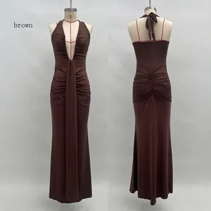 Detailed front and back view of brown halter neck dress with deep V-neck and pleats