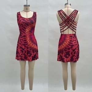 Detailed back view of a tie-dye leopard print mini dress featuring multi-strap cross design