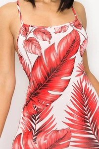 Detail of red tropical leaf print on white bodycon sundress with slim straps