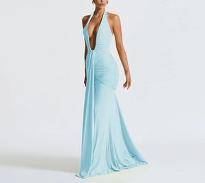 Detail of light blue halter evening dress showing deep V-neck and ruched waist details