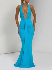 Detail of the elegant bright blue halter neck maxi dress with deep V-neck and ruched waistline