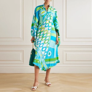 Elegant geometric print loose dress with long sleeves and stand collar for a resort style look