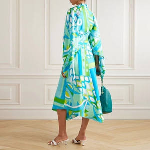 Elegant long sleeve satin midi dress with blue geometric prints and asymmetric hem