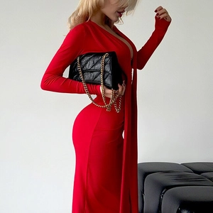 Detailed side view of slim fit red long sleeve dress with deep V-neck and decorative ribbons