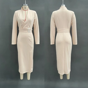 Front and back detail of beige V-neck long sleeve dress with white buckle belt