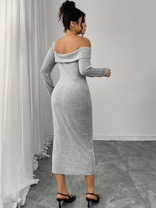 Detail of grey ribbed knit long sleeve dress with elegant off-shoulder back design