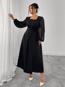 Detail of square neck and chiffon lantern sleeves on a high-waist pleated midi dress
