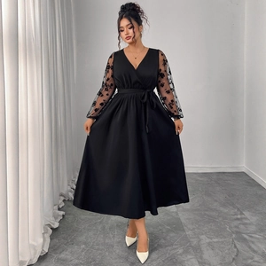 Elegant black V-neck dress with embroidered lace sleeves and waist tie detail