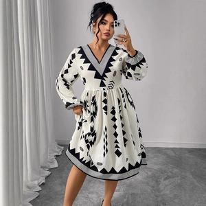 Floral V-neck dress with long puff sleeves and geometric patterns in black and white