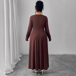 Elegant back view of long sleeve brown maxi dress with slim waist and A-line skirt