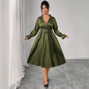 Elegant dark green V-neck high waist dress with lantern sleeves and textured satin finish