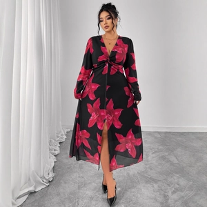 Elegant black long sleeve floral dress with deep V-neck and front slit detail