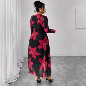 Elegant floral maxi dress in black with large pink blossoms and long sleeves back view