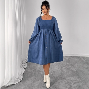 Blue smocked square neck long sleeve dress with button detail and bubble sleeves