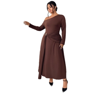 Brown long sleeve one-shoulder dress with waist buckle detail and slimming silhouette