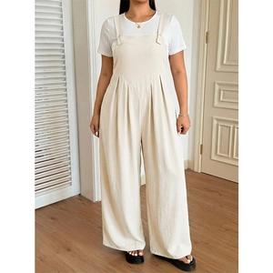 Women's cream-colored wide-leg overalls with a white T-shirt in a relaxed casual style
