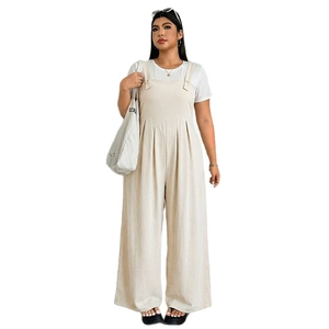 Women's cream white wide-leg jumpsuits with broad straps and pleated waist detail