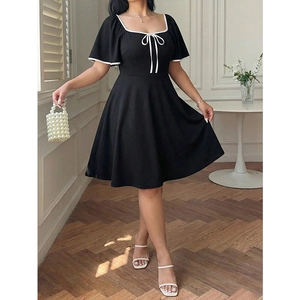 Elegant plus size black A-line dress with square neck, white trim and bow detail