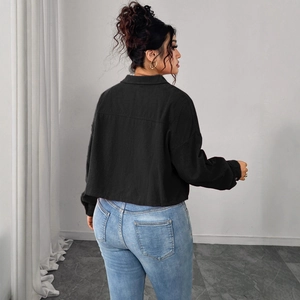 Women's black cropped corduroy jacket with puff sleeves and button-up front casual style