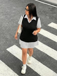 Scatto street style di un set due pezzi con gilet in maglia e abito a camicia a righe