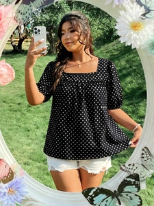 Detail of square neck polka dot blouse with puff sleeves in mirror selfie composition