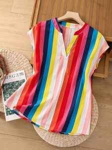 Detailed view of colorful vertical striped chiffon top with V-neck and flutter sleeves
