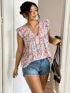 Detail of floral chiffon blouse featuring V-neck and ruffle sleeves for summer fashion