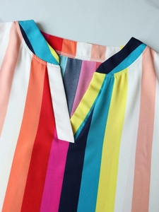 Detailed close-up of vibrant multi-color striped chiffon top with a stylish V-neck design