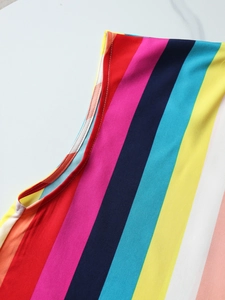 Detailed close-up showing rainbow stripe pattern and fine double-needle stitching on chiffon