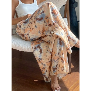 High-waisted tie-dye wide-leg trousers for women with a relaxed fit and earthy tones