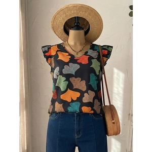 Women's V-neck sleeveless top with colorful ginkgo leaf print and ruffle sleeve details