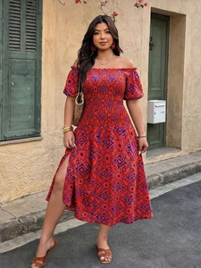Outdoor street shot of summer off-shoulder geometric print midi dress with side slit
