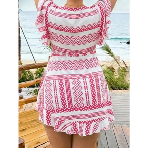 Pink and white geometric print vacation top with V-neck, ruffles and tie front