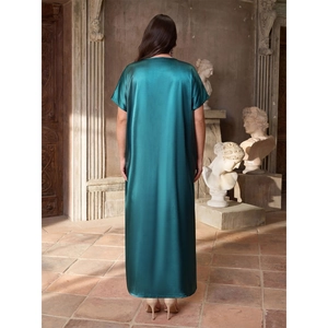Elegant dark green satin maxi dress with short sleeves and a luxurious floor-length fit