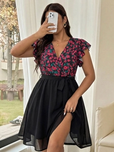 Detail of V-neck floral bodice with black wrap waist tie and lightweight fabric