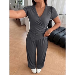 Women's grey two-piece lounge set with V-neck wrap top and wide-leg trousers