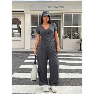 Women's plus size grey V-neck knit set with ruched top and wide leg pants for casual wear
