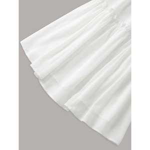 White multi-layered tiered cake skirt with ruffled chiffon hemline and elastic waist