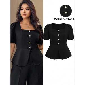 Detail of square neck puff sleeve top with metal buttons and wide leg trousers