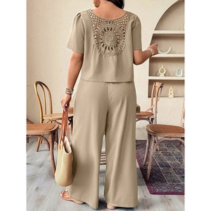 Detailed back view of khaki set featuring intricate circular crochet hollow-out design